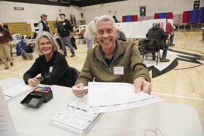 Top Story No. 4: Election Day Conway handing ballot