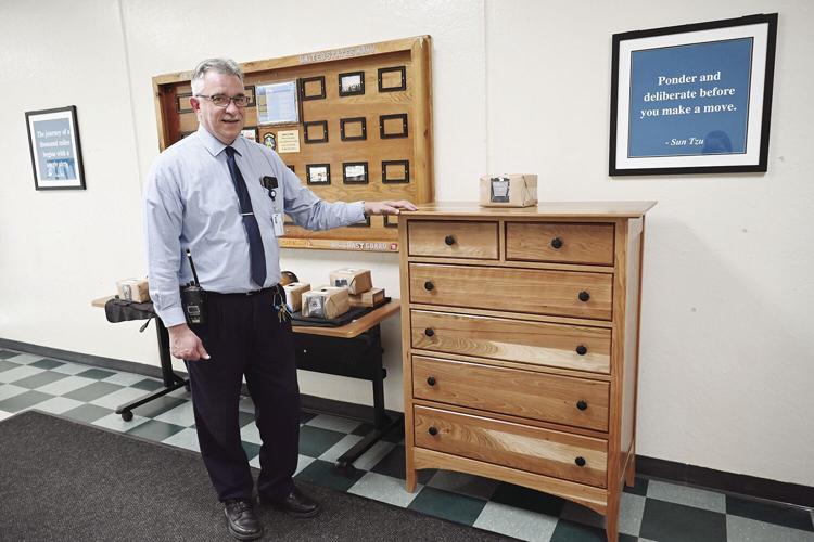 Maine State Prison industries manager with dresser