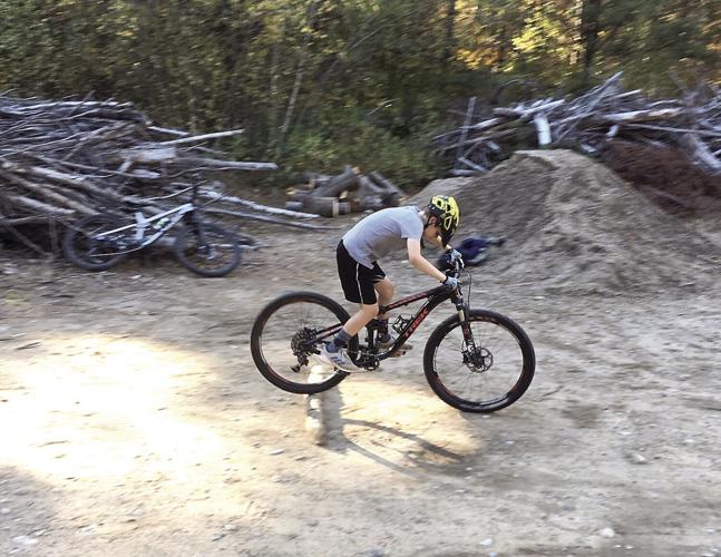 Wheel Family Fun - rider clears the log feature