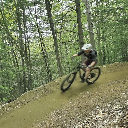 Wheel Family Fun - rider coming down Cranmore Mountain