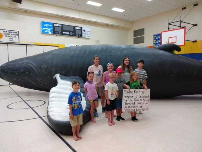 Summer reading program allows kids to experience Nile a life-sized inflatable whale