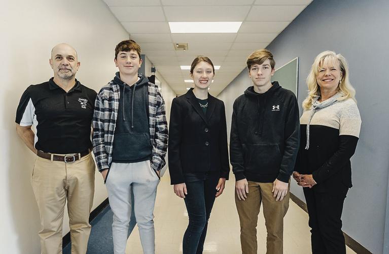 Three KHS students private pilot exams with Riddensdale and Schrader