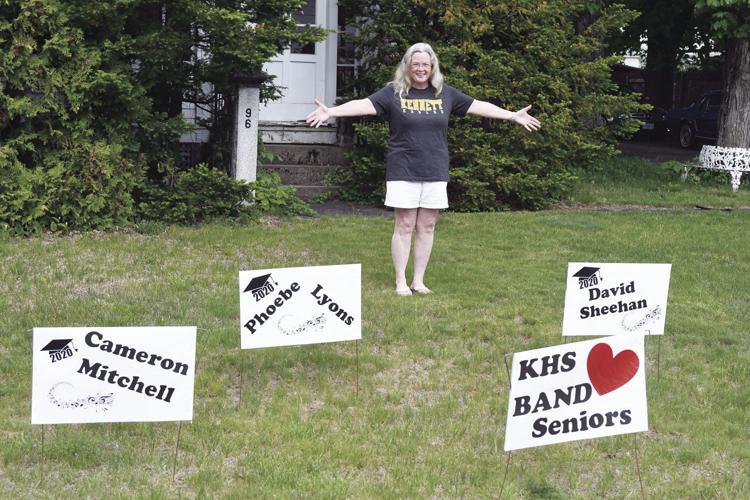 Therese Davison with signs