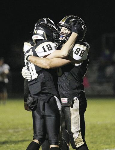 10-29-21 KHS FB celebration hug vertical