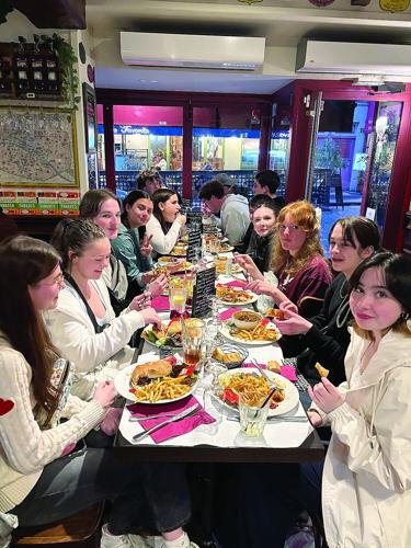 Kennett High students in France - eating dinner