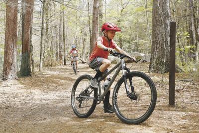 07-08-22 NCCC Adventure Camp biking turning corner