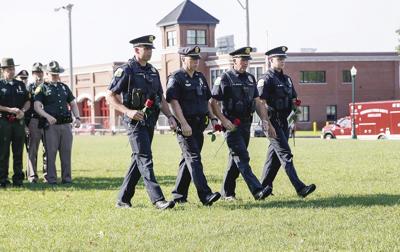 09-11-24 9-11 Remembrance flower pd walking