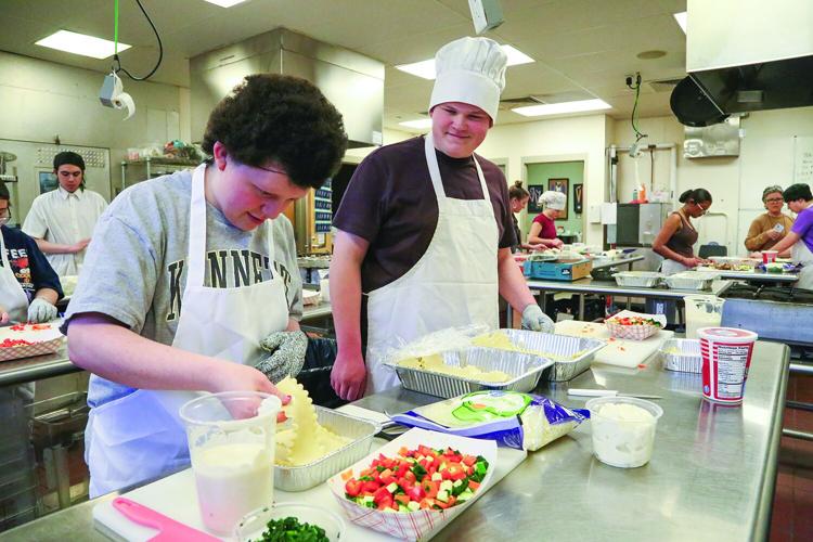 04-10-26 KHS Cooking Workshop helping pair