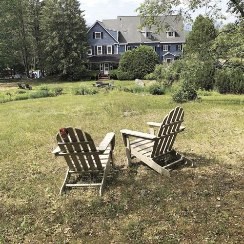 Darby Field Inn exterior with chairs