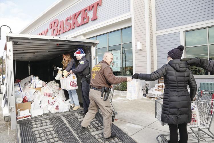 12-14-24 PD Food Drive filling trailer side