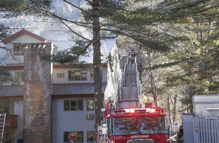 12-20-23 Attitash Mtn Village Fire on ladder widest