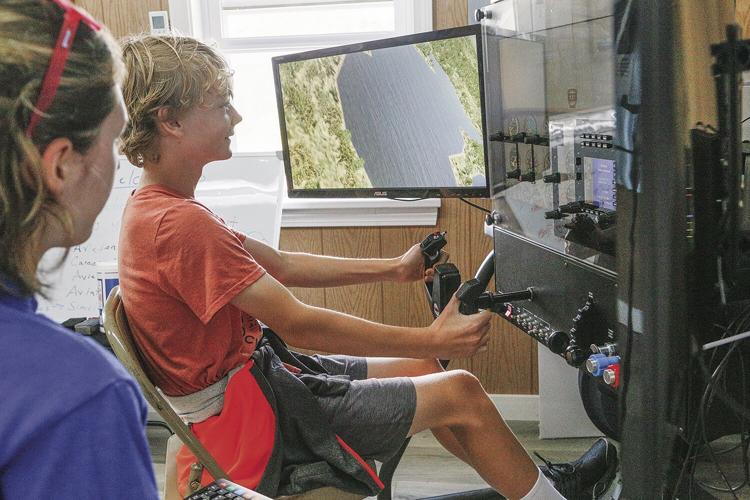 08-26-23 Aviation Academy Day flight simulator tighter