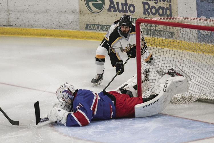 12-07-22 KHS Hockey fusco digging