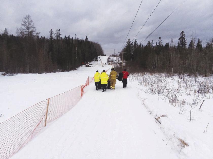 One injury and a lucky break for 3 snowmobilers