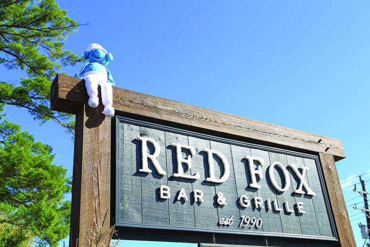 10-01-25 Pumpkin People red fox on sign