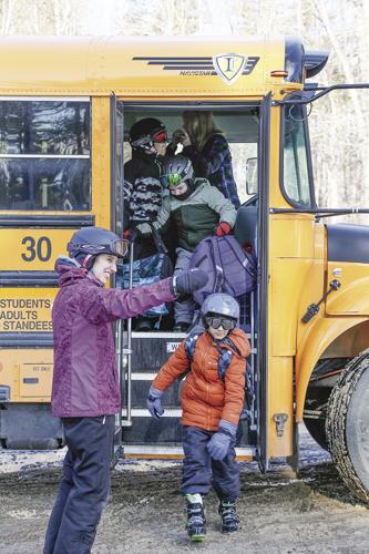 01-14-25 ESSC at Cranmore getting off bus vertical