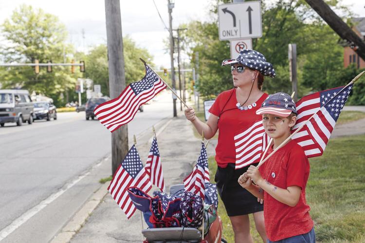 07-04-22 4th Conway waving flags before parade