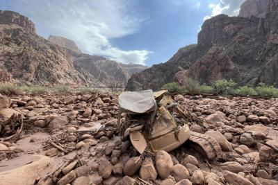 Mud and debris, including a mangled piece of construction equipment, remain after a flash flood in Grand Canyon National Park on Aug. 31, 2026.