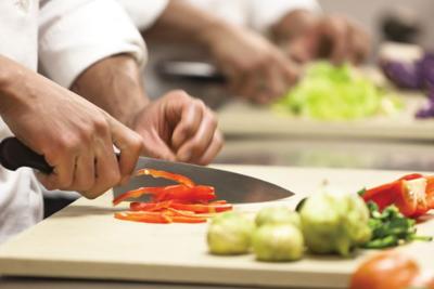 Chef cutting food