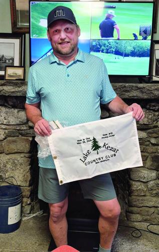 GOLF COLUMN - Lake Kezar - Ben McIntyre with hole-in-one flag