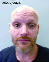 Police seek fugitive with links to Coos