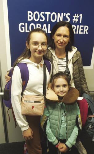 mom girls at logan.jpg