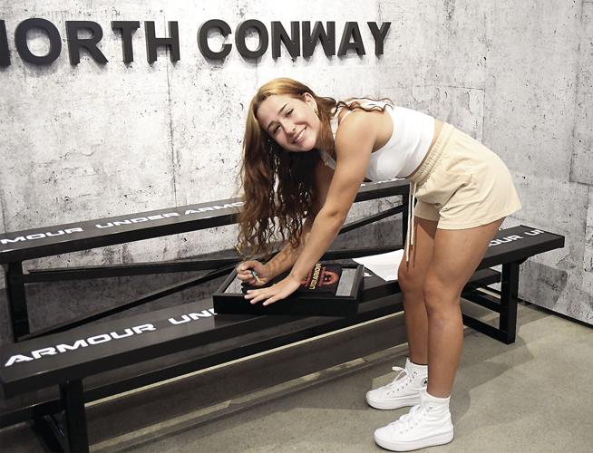 Madison Walcott at Under Armour - Aida Wheat signing shirt