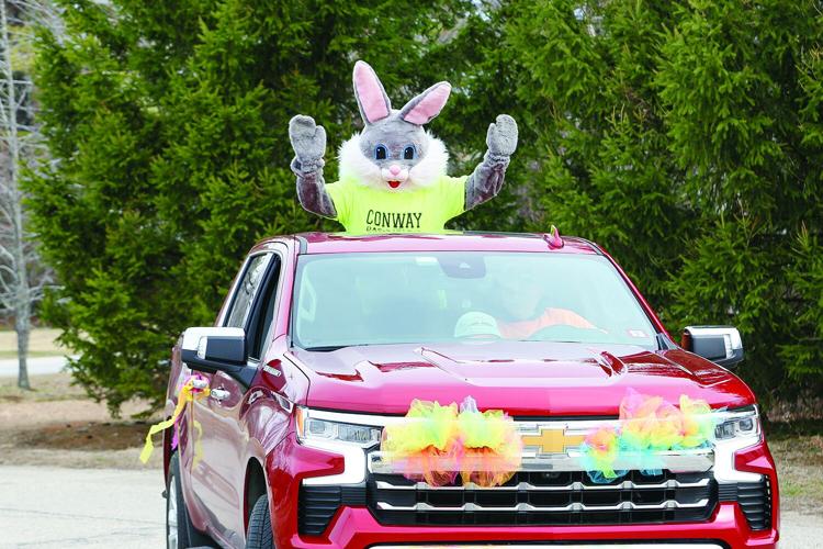 04-19-25 Mobile Egg Hunt waving from truck medium