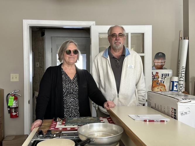 Jeanne L. Robillard, CEO of Tri-County CAP and Gerald Milliken, department head of facilities