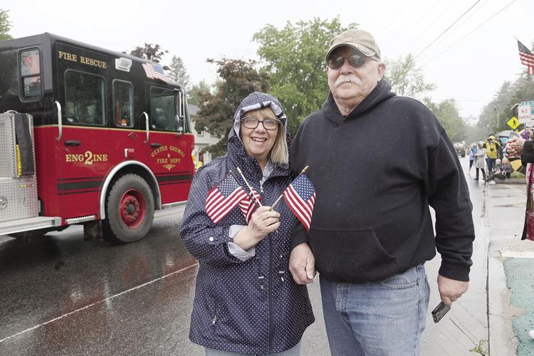 05-27-24 Mem Day Fryeburg parade smile with flags couple