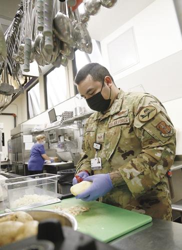 01-04-21 National Guard peeling potatoes