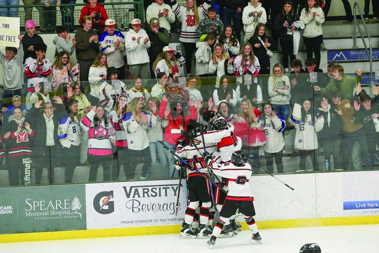 03-11-26 KHS-BG Frozen Four celebrating win by fans 3