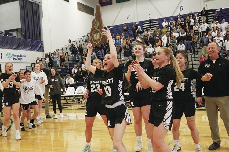 03-12-23 KHS WBB cheer with trophy wider
