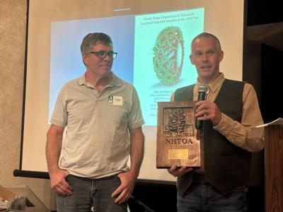 Tracey Robinson (right) named Outstanding Forest Products Trucker of the Year