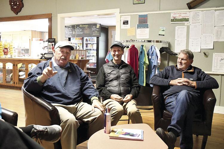 The Golf Column - Lake Kezar - current photo of caddies laughing 2