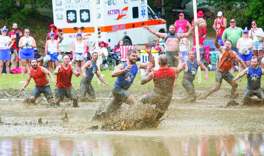 09-06-25 Mud Bowl running to block
