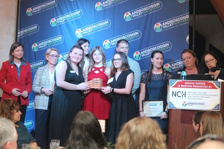 Berlin High School students accept the BoomPier award