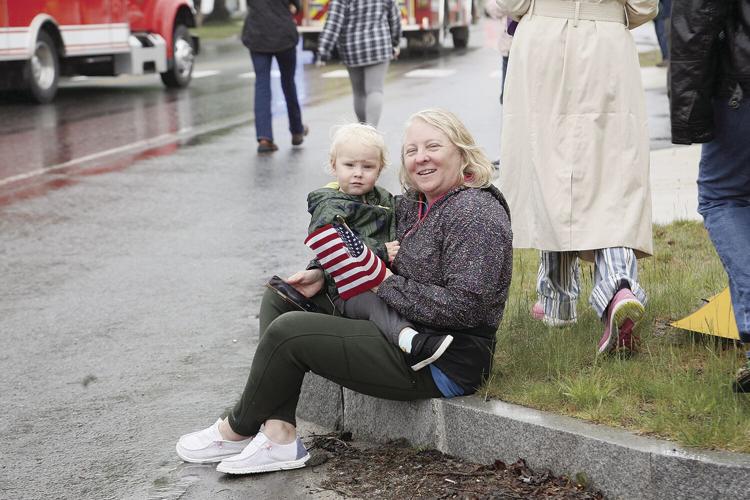 05-27-24 Mem Day Fryeburg parade smile with flags eastwood