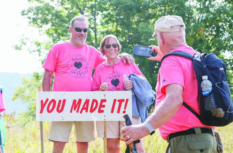 09-14-24 JF Climb pose with sign