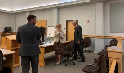 Trial Date set for ExSen Woodburn on Domestic Violence