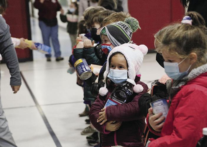 11-19-21 Food March cradling juice