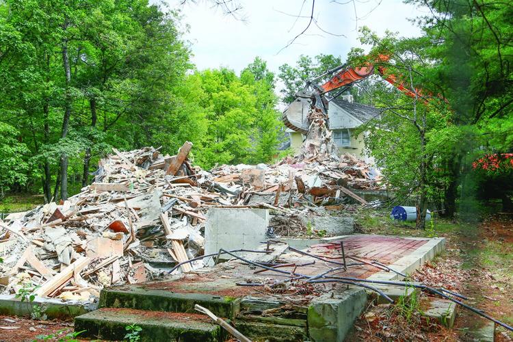 07-17-25 Condo Demo grabbing debris wider
