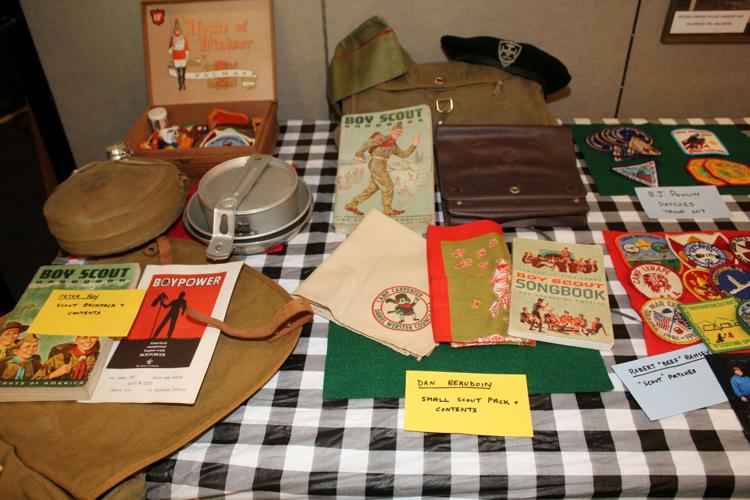 Boy Scout handbooks from decades past