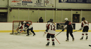 Caron and Berlin/Gorham defense silence Bishop Brady/Trinity 3-0