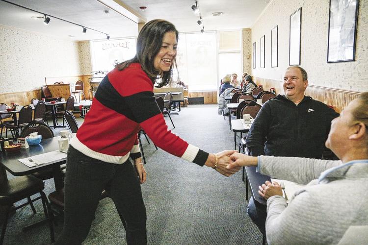 01-20-24 Ayotte at Bea's shaking hands diner