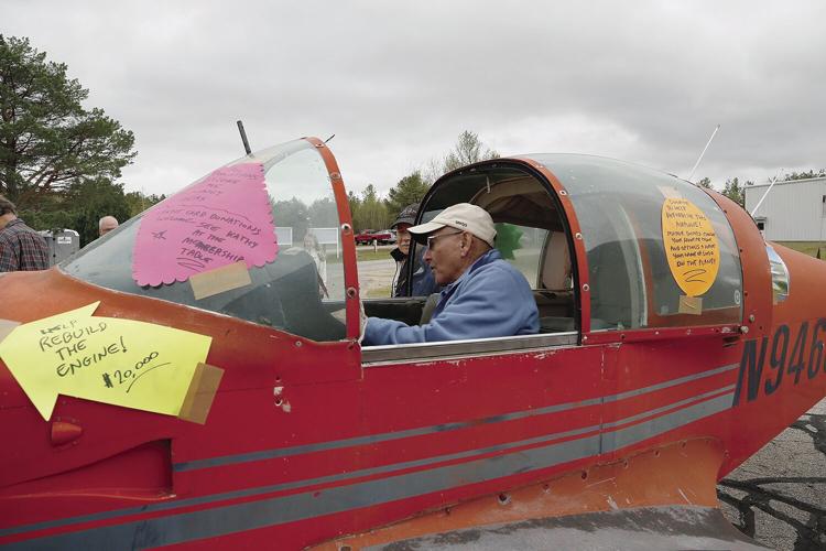 07-03-21 Aviation Academy Ed Bergeron sitting on cockpit