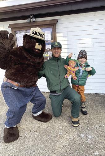Pine Tree Gingerbread Men - Alden Hoffer with Dad and Smokey Bear