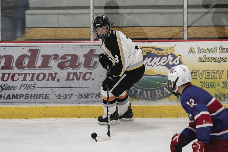 12-07-22 KHS Hockey laughland tight