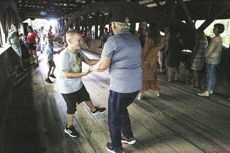 08-07-21 Bridge Dance kid and aunt dancing medium