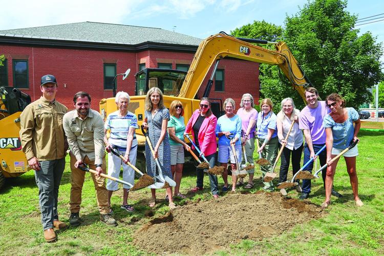 08-05-26 Library Park Groundbreaking digging smile